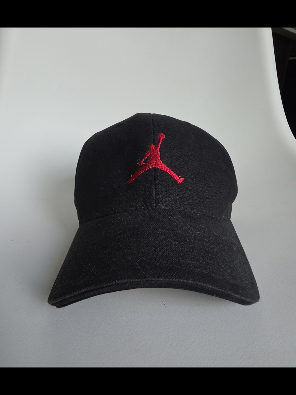 SOLD. Nike Jordan Black Cap with Red Jumpman Logo